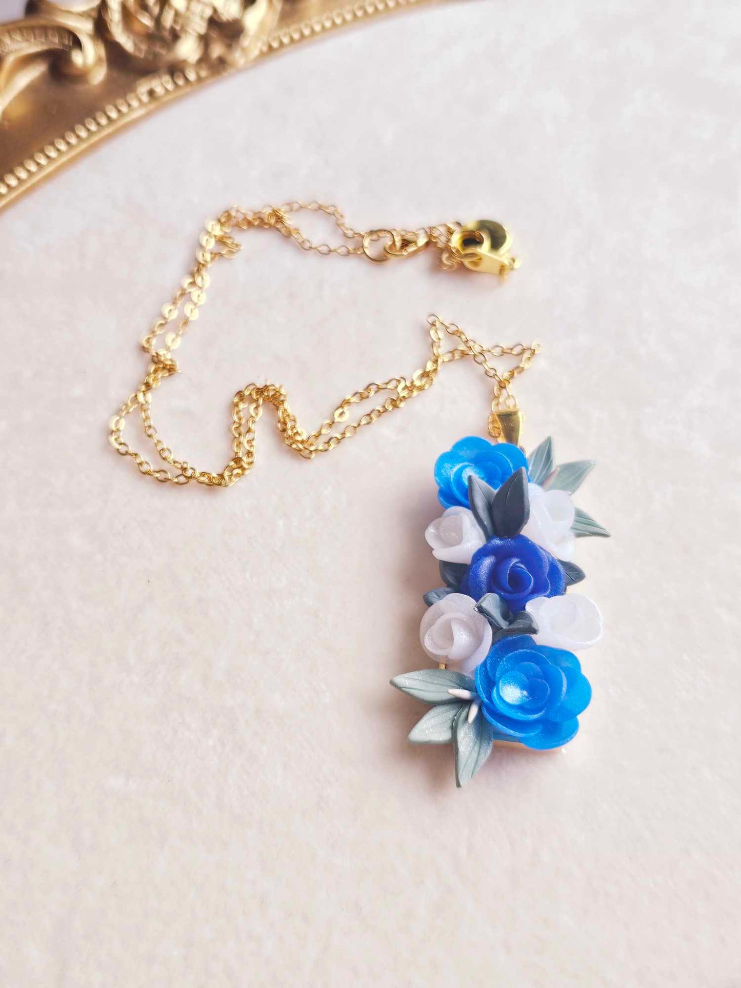 Blooming blue rose pendant necklace