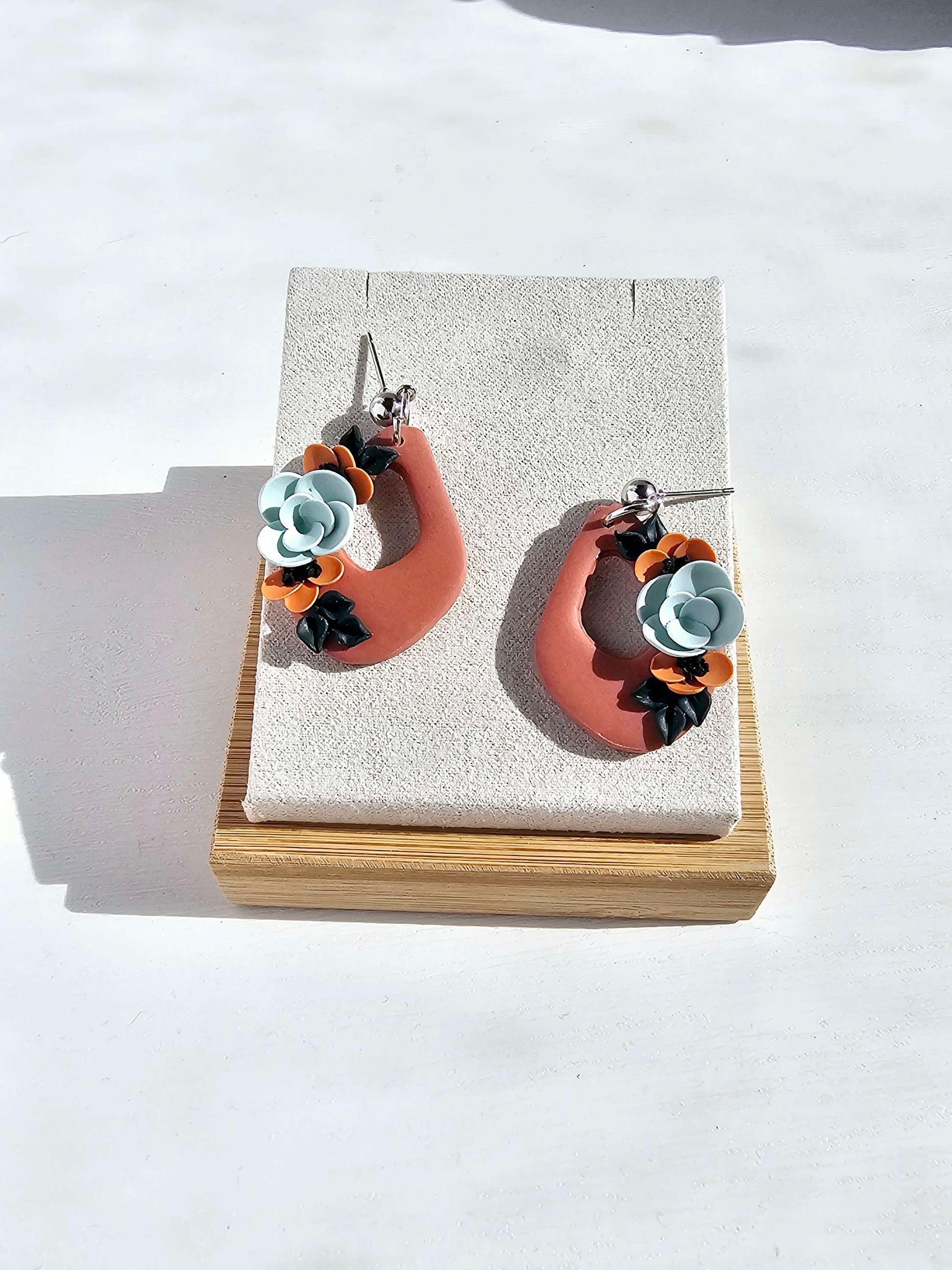 Terracotta dangle earrings with floral design image 3