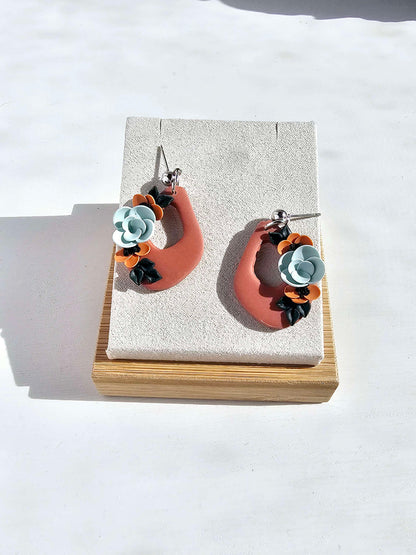 Terracotta dangle earrings with floral design image 3