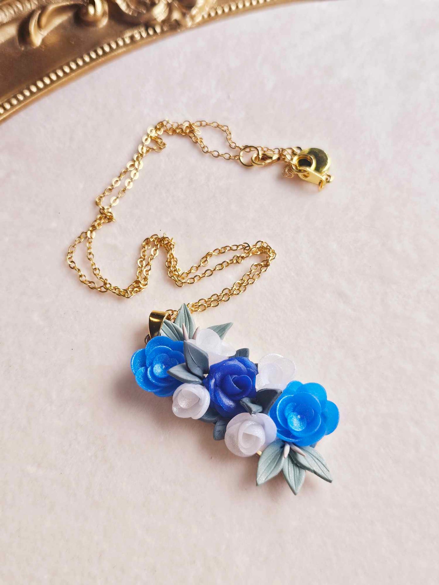 Blooming blue rose pendant necklace