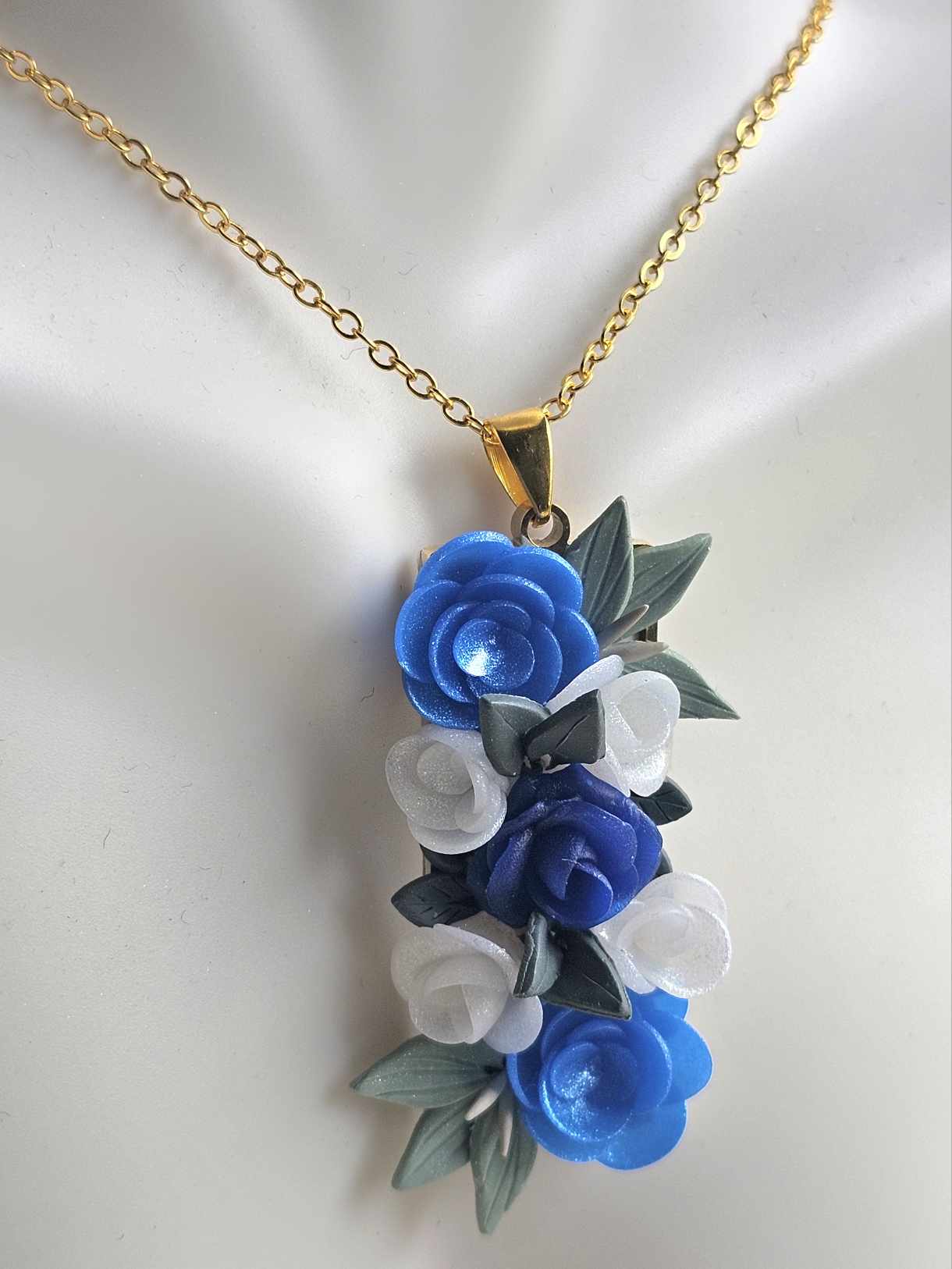 Blooming blue rose pendant necklace