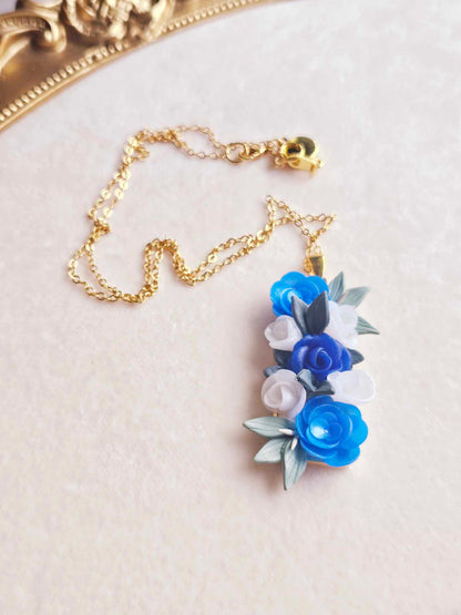 Blooming blue rose pendant necklace
