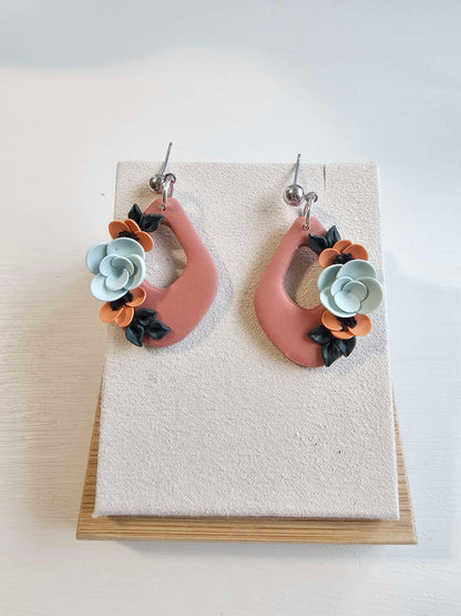 Terracotta dangle earrings with floral design image 1