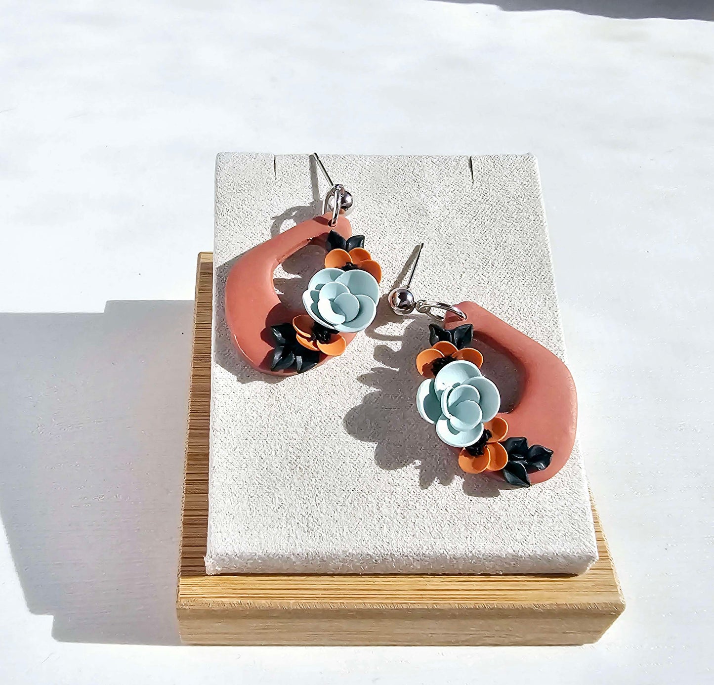 Terracotta dangle earrings with floral design image 2