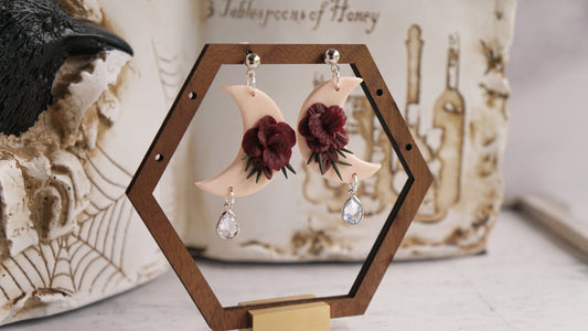 White floral moon dangles image 0